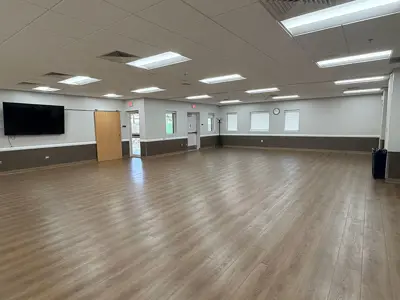 empty room with wood floors available for rent