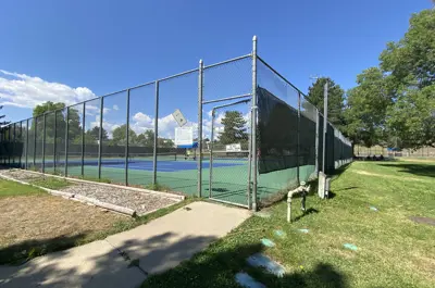 Outdoor recreation courts in a neighborhood park.