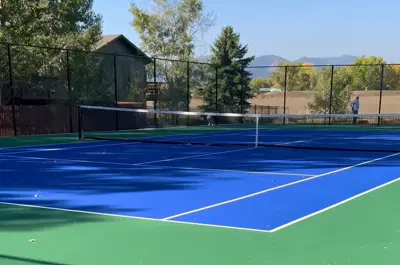 Outdoor recreation courts in a neighborhood park.