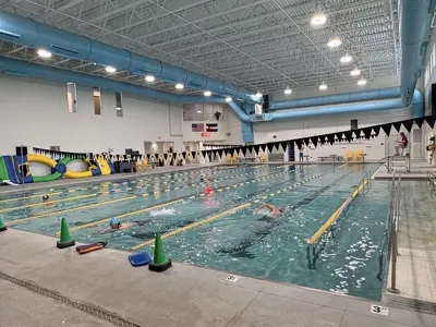 Indoor pool with marked lap lanes.